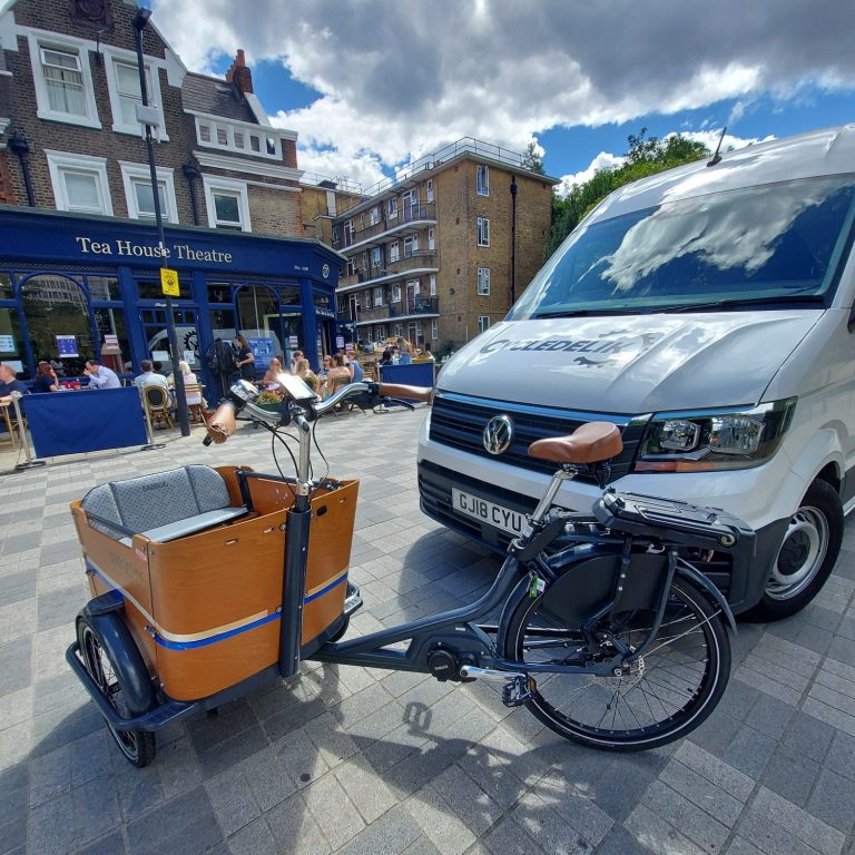 CYCLEDELIK on the spot repair while customer drinking tea at the Tea House in Vauxhall London.